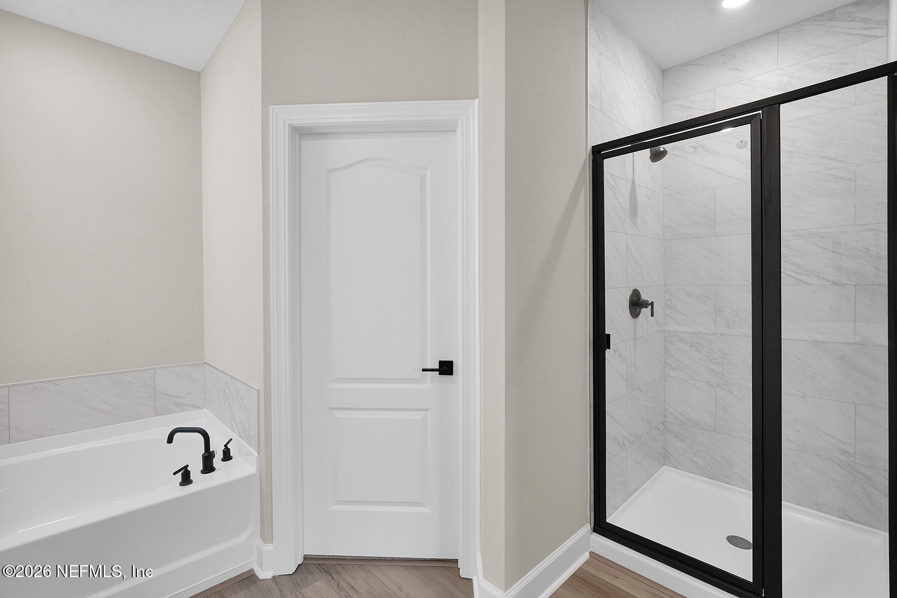 2416 Pemrose Loop Middleburg, FL 32068 - Photo 14 of 26 a bathroom with a bathtub