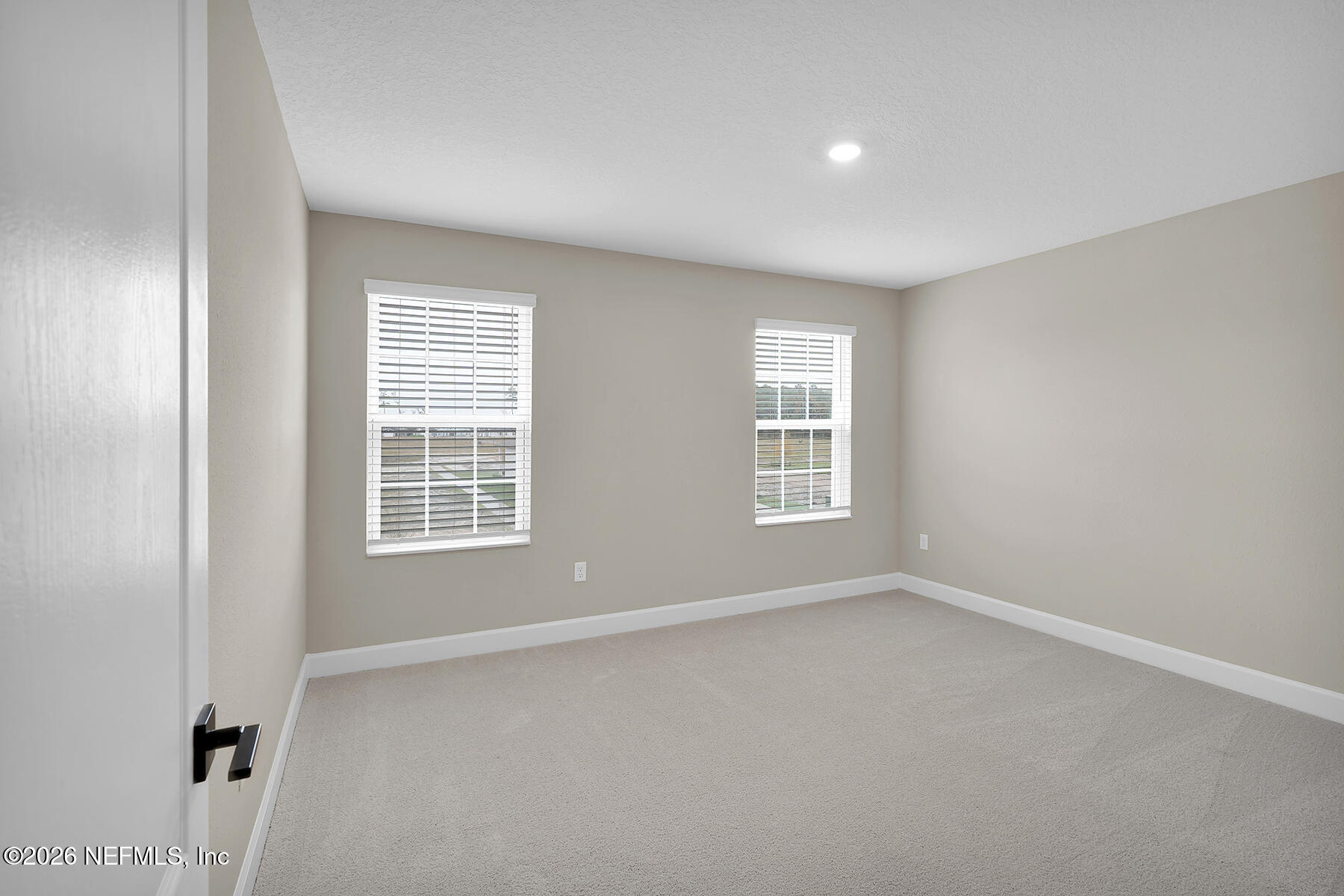 2416 Pemrose Loop Middleburg, FL 32068 - Photo 16 of 26 an empty room with a window