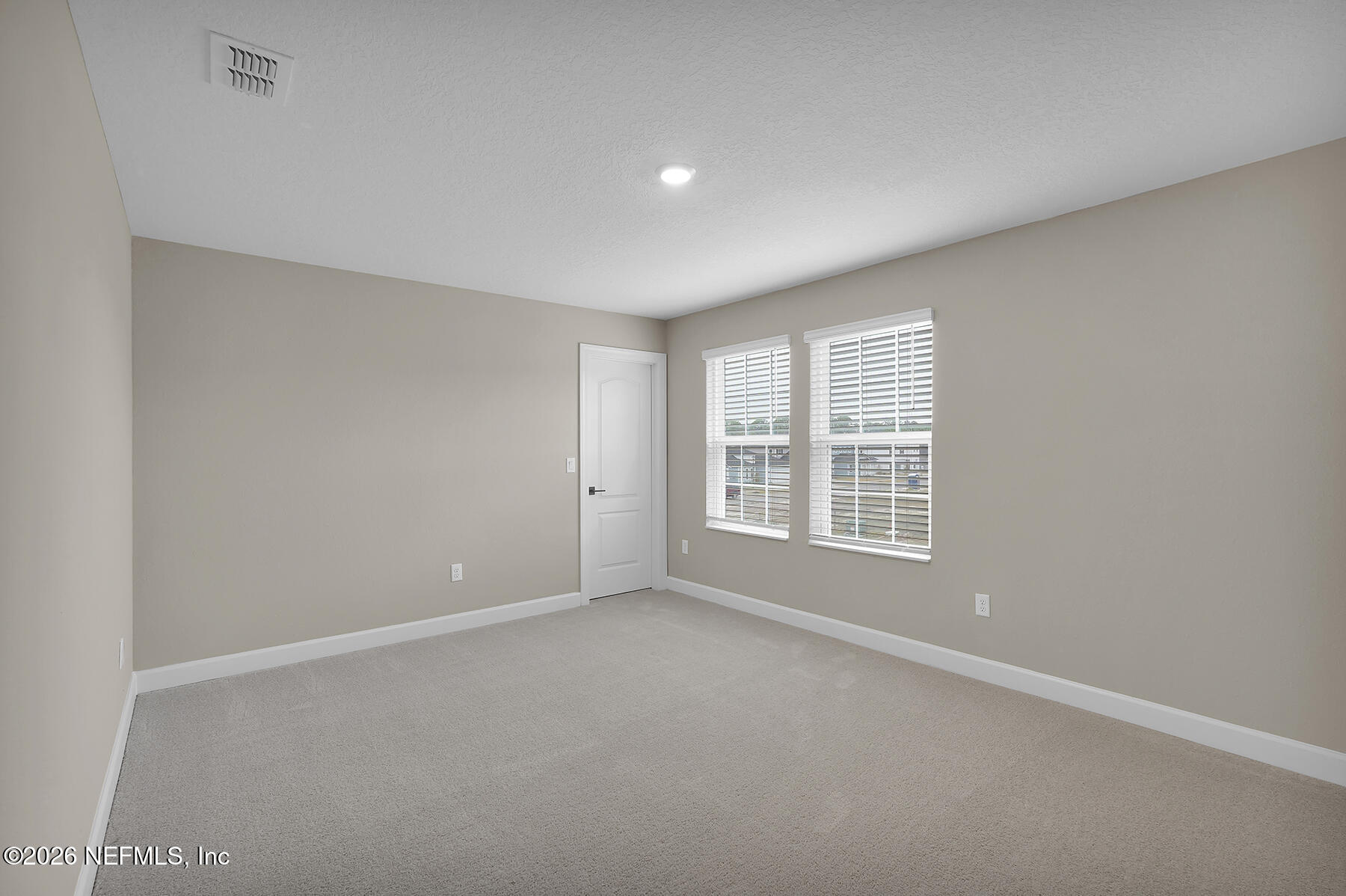 2416 Pemrose Loop Middleburg, FL 32068 - Photo 21 of 26 a view of an empty room with a window