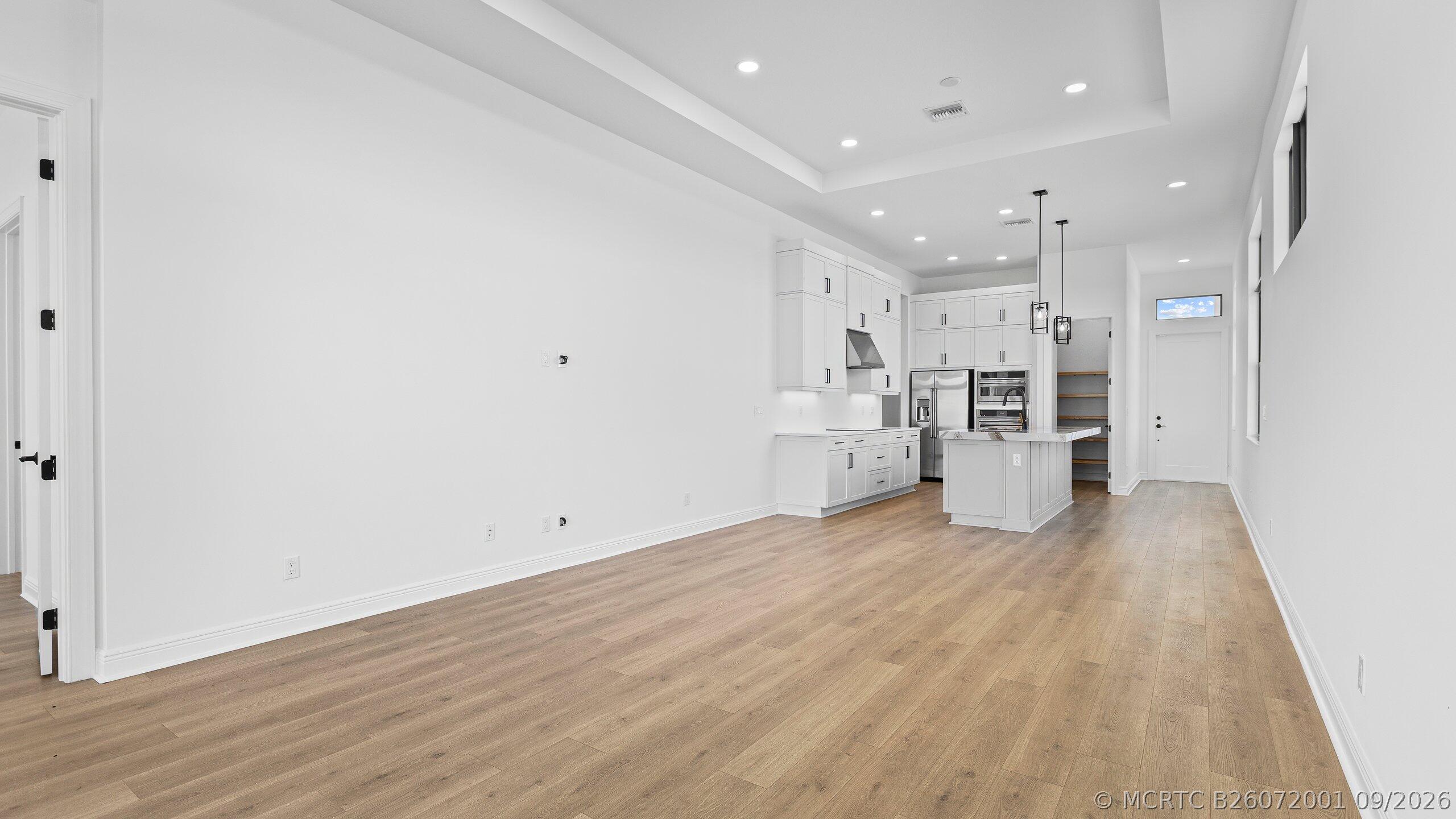 7999 Southwest Andrea Way Port St. Lucie, FL 34987 - Photo 10 of 64 Great Room-Kitchen