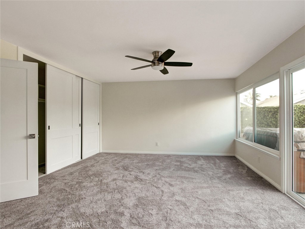 933 Carnation Avenue Costa Mesa, CA 92626 - Photo 11 of 33 a view of an empty room with a window
