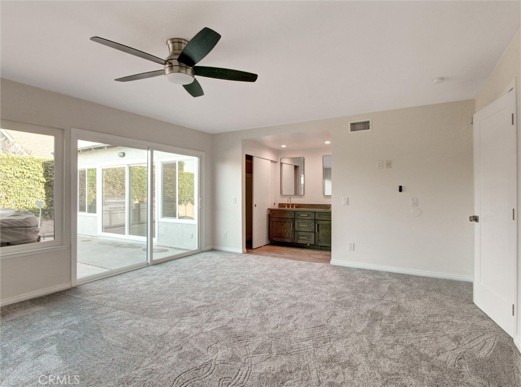 933 Carnation Avenue Costa Mesa, CA 92626 - Photo 13 of 33 a view of an empty room with a window