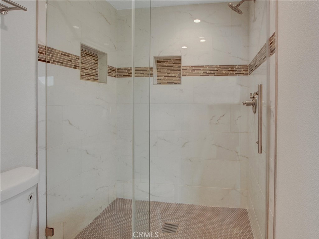 933 Carnation Avenue Costa Mesa, CA 92626 - Photo 17 of 33 a bathroom with a shower