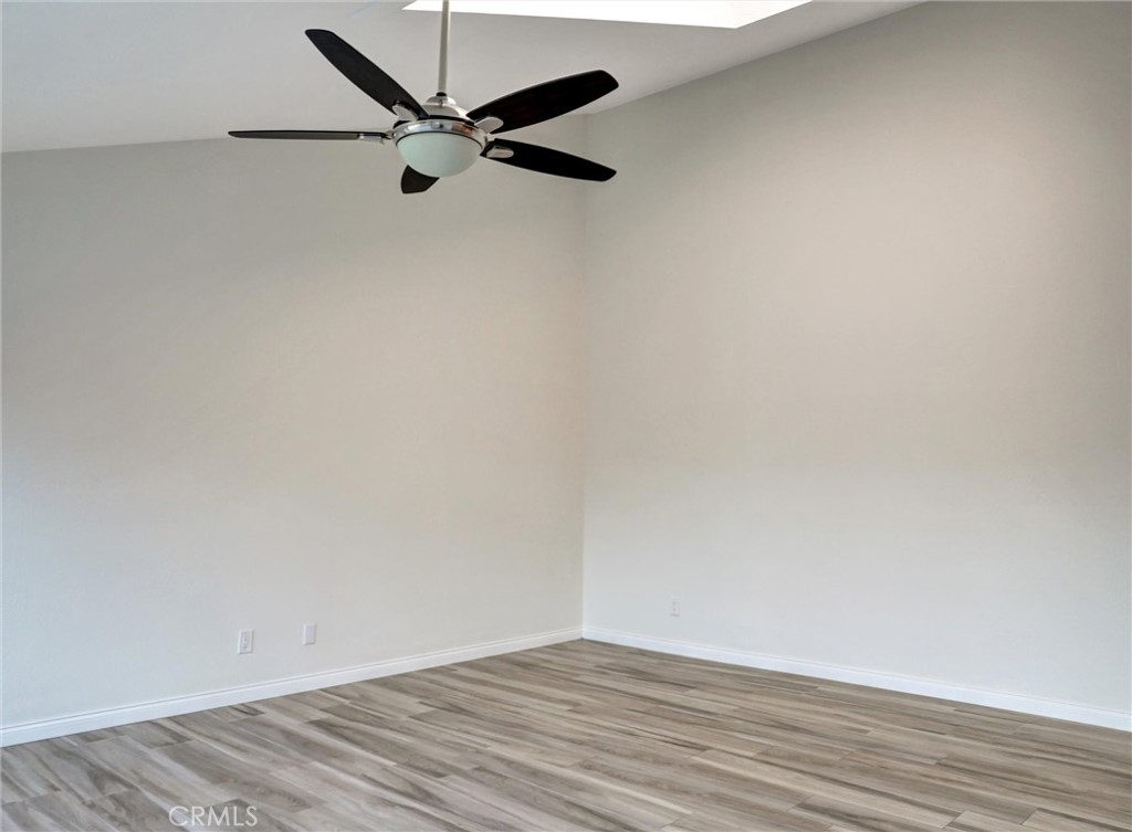 933 Carnation Avenue Costa Mesa, CA 92626 - Photo 27 of 33 a view of a big room with wooden floor