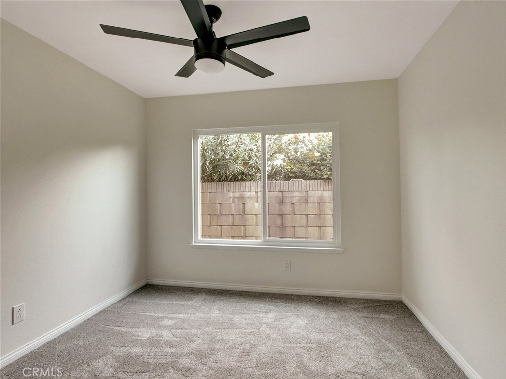 933 Carnation Avenue Costa Mesa, CA 92626 - Photo 5 of 33 an empty room with a window