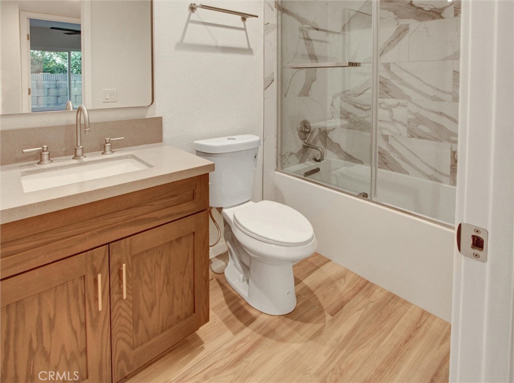 933 Carnation Avenue Costa Mesa, CA 92626 - Photo 7 of 33 a bathroom with a sink toilet and shower
