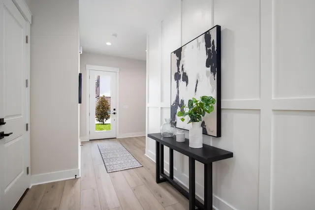 a view of a hallway and interior of the house