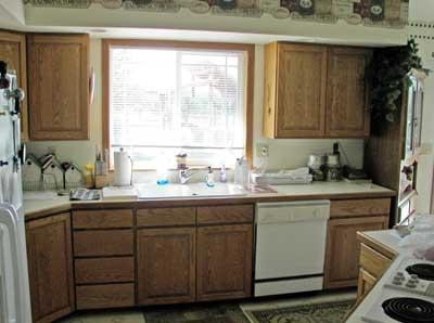 10542 Mieras Road Moxee, WA 98936 - Photo 7 of 29 a kitchen with a sink and cabinets