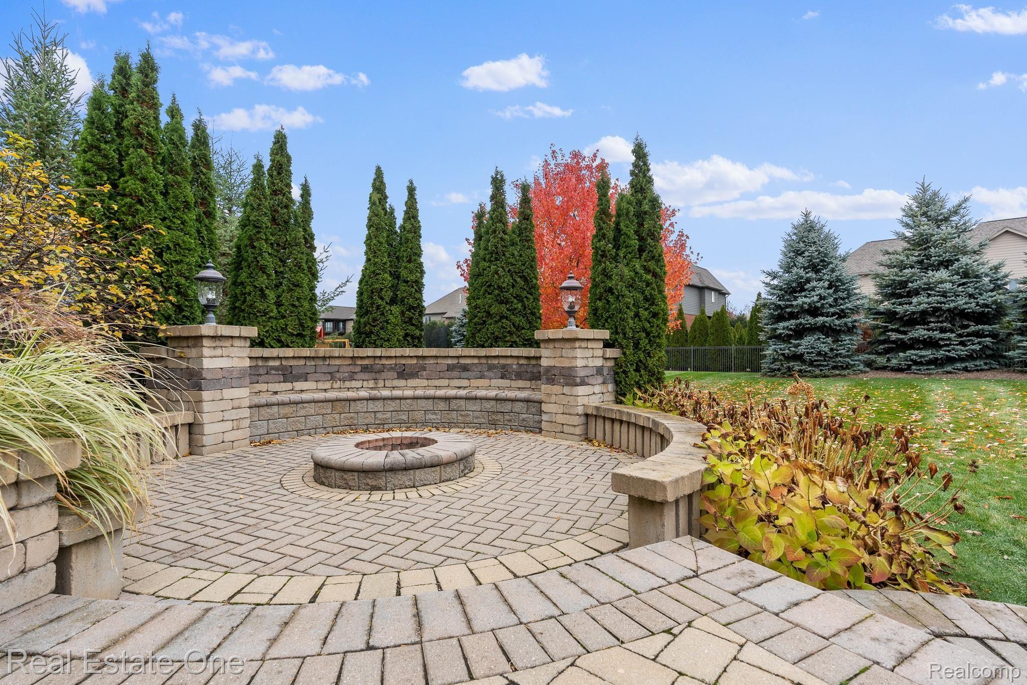 1577 Serene Court Rochester, MI 48306 - Photo 35 of 38 Patio with built-in firepit