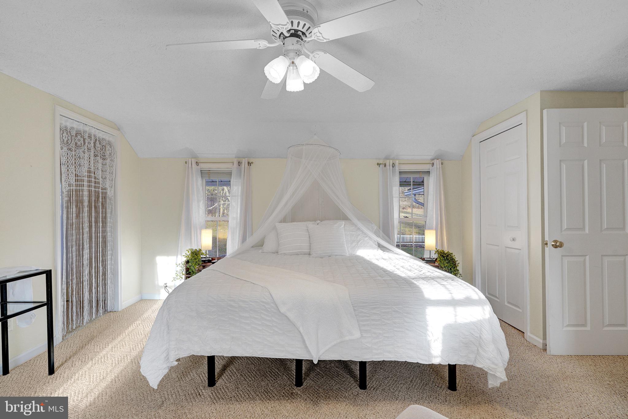 259 A A-Frame Road Coudersport, PA 16915 - Photo 35 of 130 Serene bedroom with natural light.