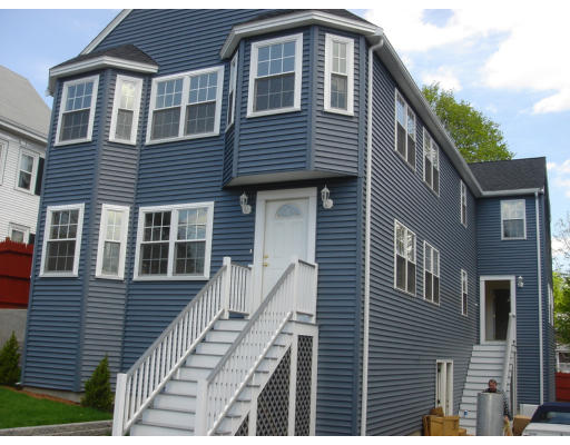 a front view of a house with a balcony