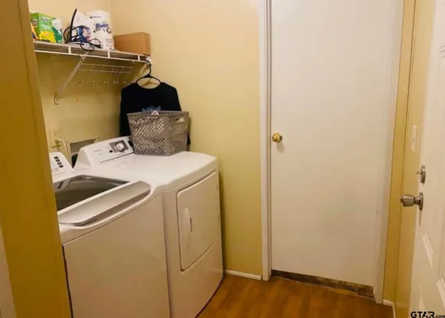 a utility room with dryer and washer