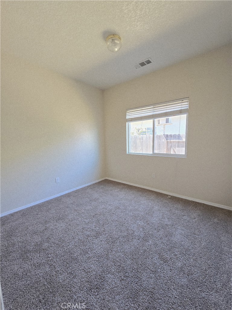 2656 Mira Court Merced, CA 95341 - Photo 13 of 23 an empty room with a window