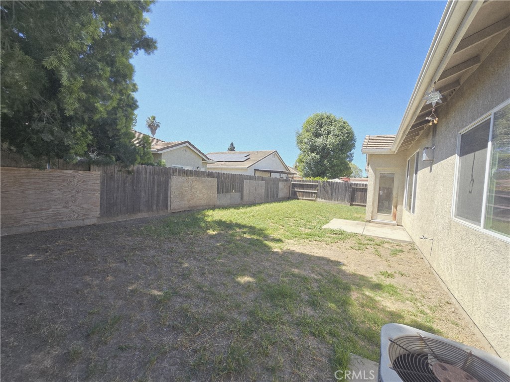 2656 Mira Court Merced, CA 95341 - Photo 21 of 23 a view of a house with a yard and sitting area