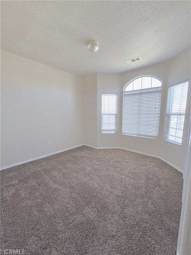 2656 Mira Court Merced, CA 95341 - Photo 10 of 23 an empty room with windows