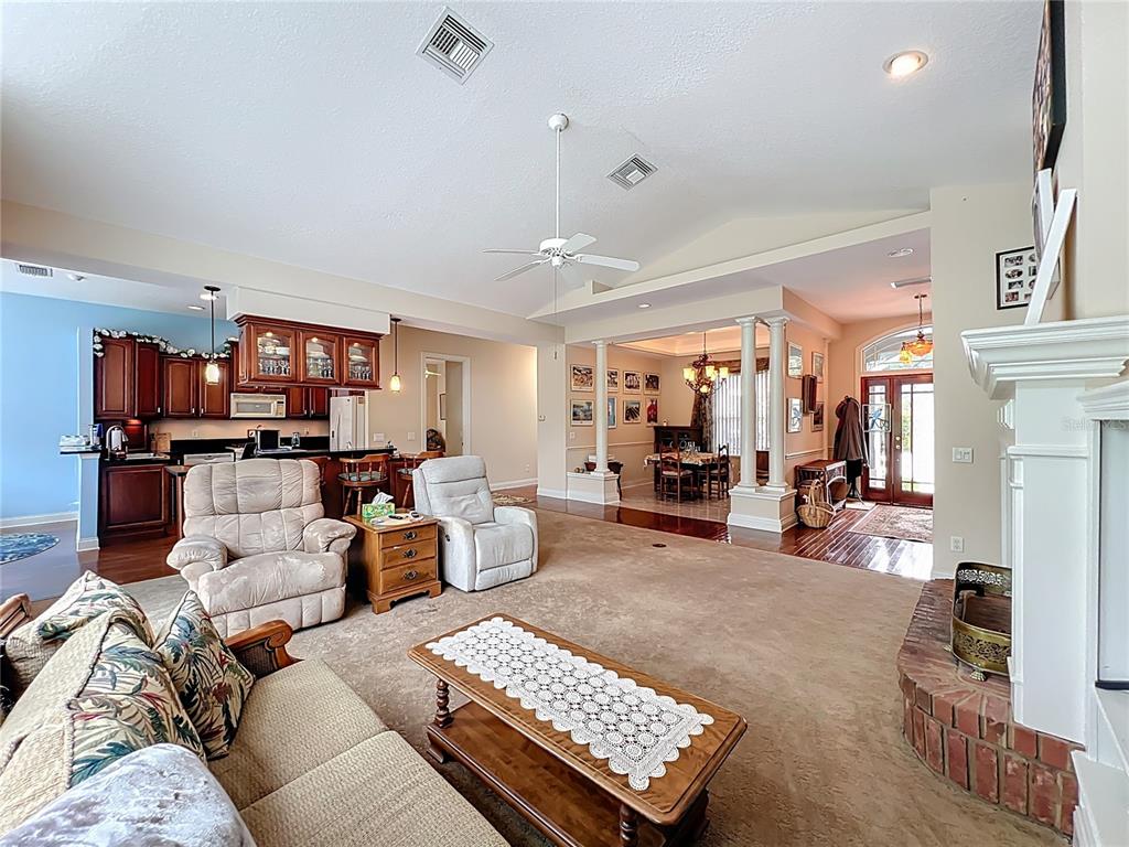 214 Chestnut Ridge Street Winter Springs, FL 32708 - Photo 17 of 68 a living room with furniture and a flat screen tv