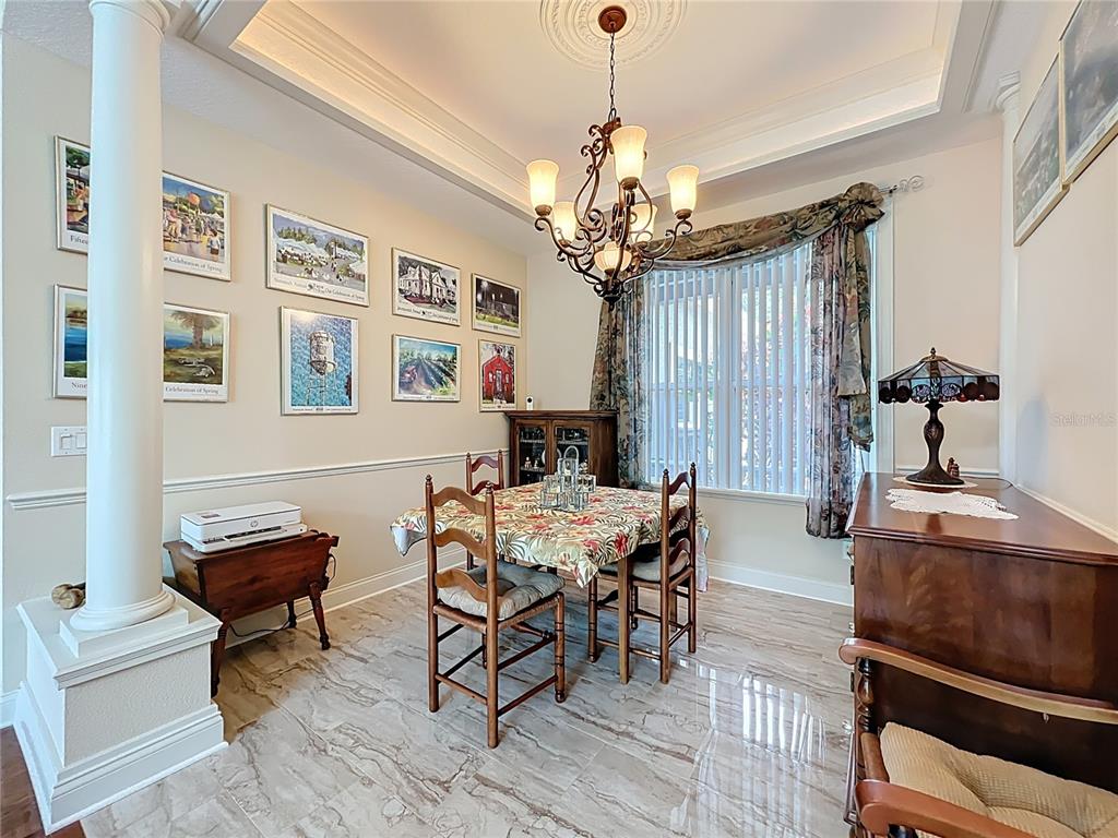 214 Chestnut Ridge Street Winter Springs, FL 32708 - Photo 27 of 68 a view of a livingroom and dining room