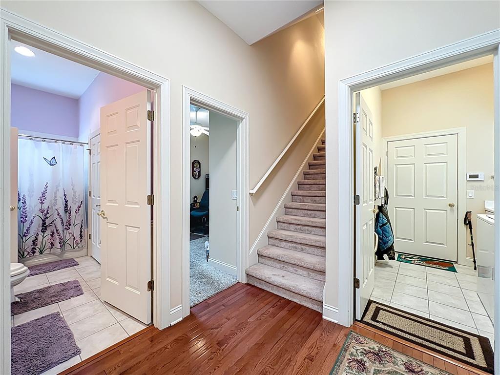 214 Chestnut Ridge Street Winter Springs, FL 32708 - Photo 40 of 68 a view of a hallway with wooden floor and entryway
