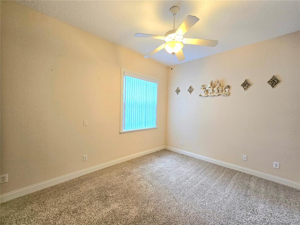 214 Chestnut Ridge Street Winter Springs, FL 32708 - Photo 44 of 68 a view of an empty room with a window