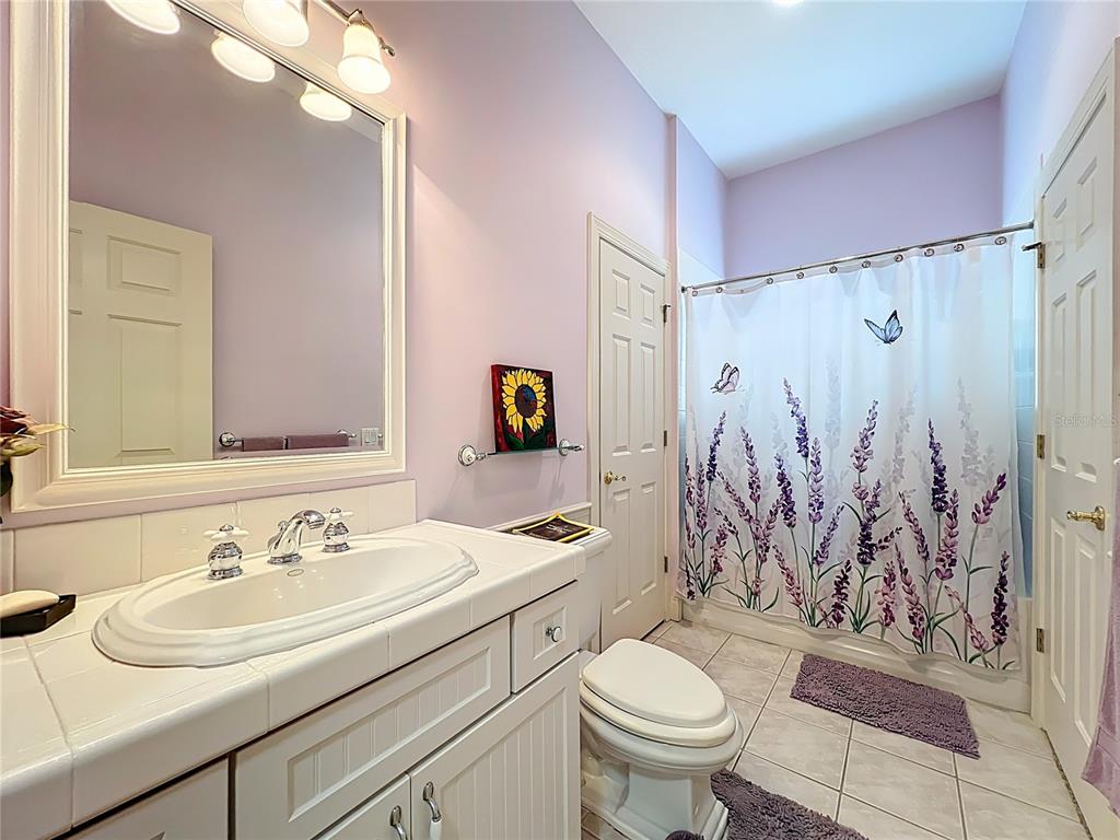 214 Chestnut Ridge Street Winter Springs, FL 32708 - Photo 45 of 68 a bathroom with a sink toilet and shower