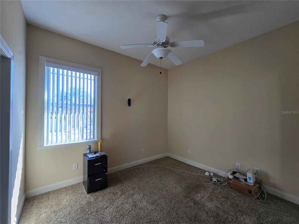 214 Chestnut Ridge Street Winter Springs, FL 32708 - Photo 50 of 68 an empty room with a window