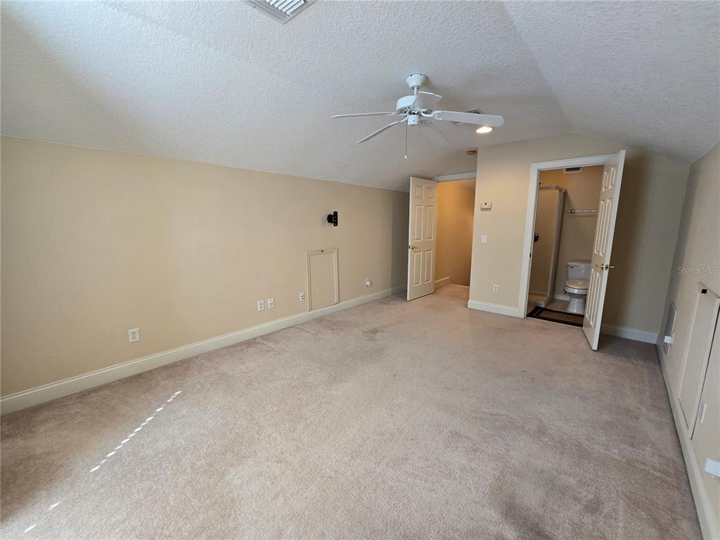 214 Chestnut Ridge Street Winter Springs, FL 32708 - Photo 54 of 68 an empty room with fan and entrance