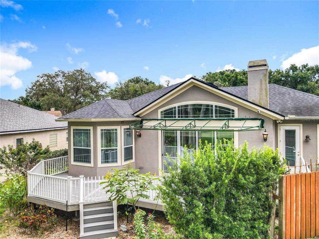 214 Chestnut Ridge Street Winter Springs, FL 32708 - Photo 63 of 68 a front view of a house with a yard