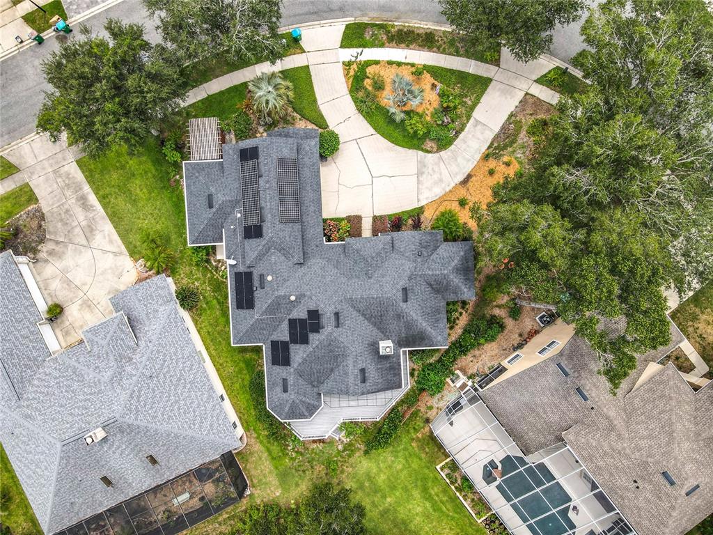 214 Chestnut Ridge Street Winter Springs, FL 32708 - Photo 66 of 68 an aerial view of a house with a swimming pool