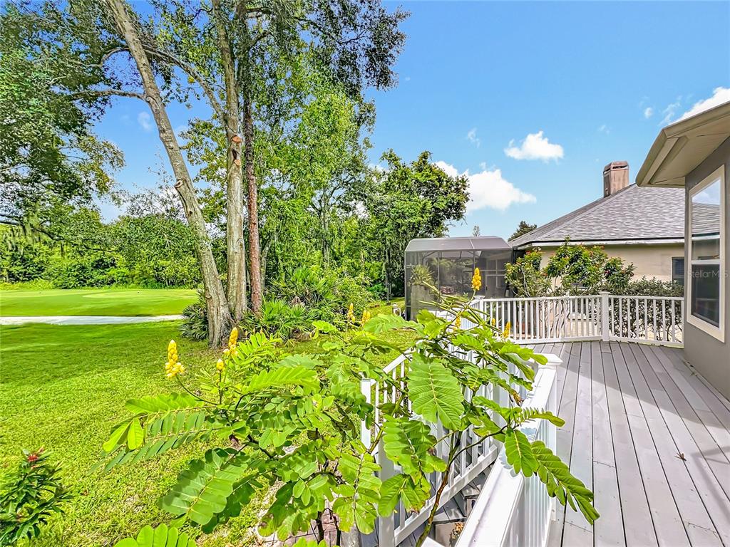 214 Chestnut Ridge Street Winter Springs, FL 32708 - Photo 10 of 68 a balcony with yard and outdoor seating