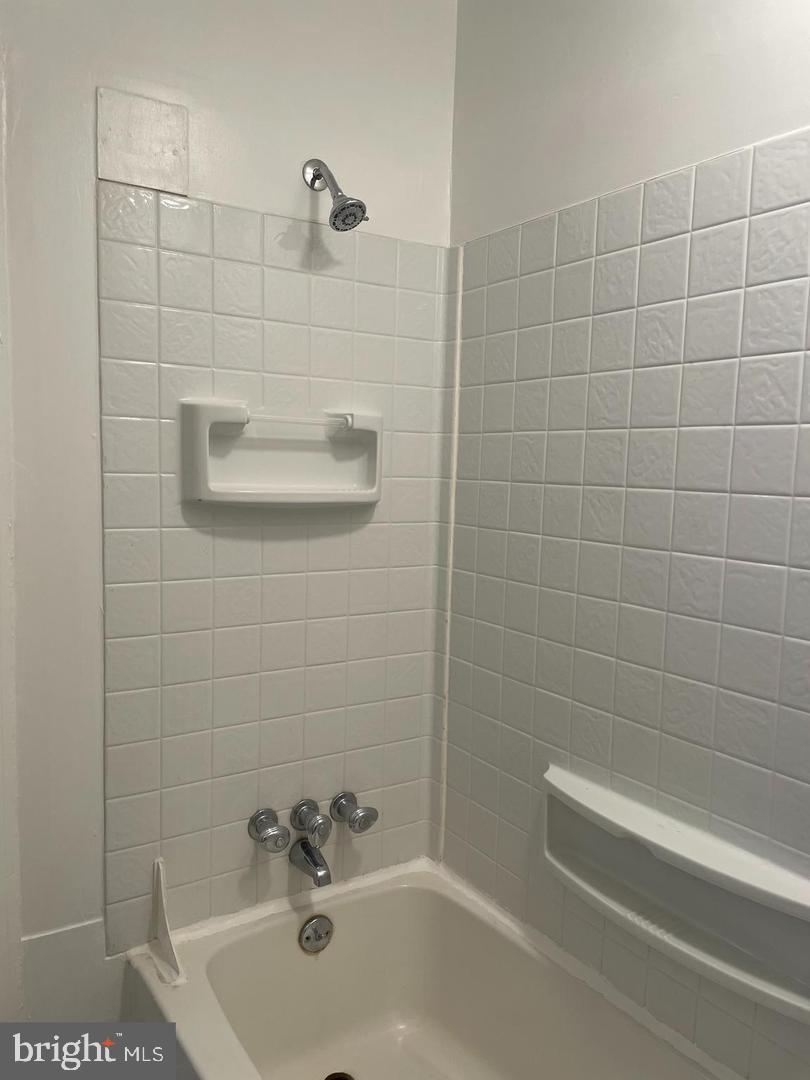 67 Sunshine Road Upper Darby, PA 19082 - Photo 13 of 21 a bathroom with a sink and a shower