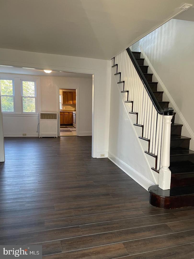 67 Sunshine Road Upper Darby, PA 19082 - Photo 5 of 21 a view of entryway and hall with wooden floor