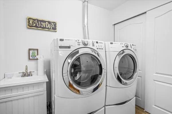 a utility room with dryer and washer