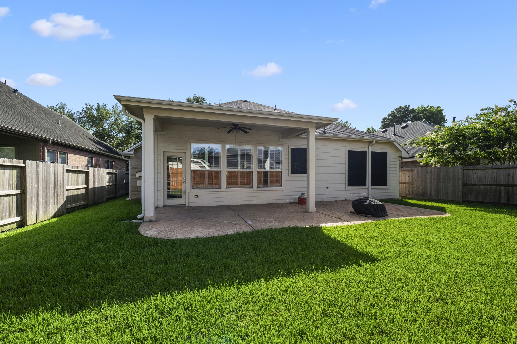 20014 Queens Oak Court Spring, TX 77379 - Photo 28 of 49 a view of an house with backyard space and garden