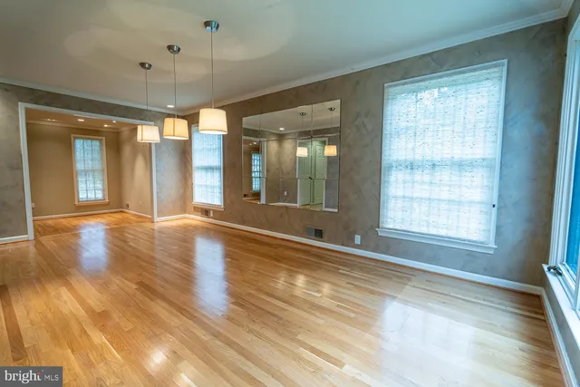 a view of entryway with wooden floor