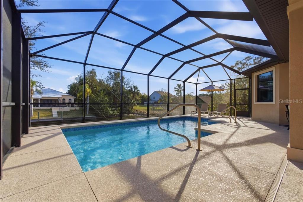 8 Cochran Lane Palm Coast, FL 32137 - Photo 33 of 40 a view of a backyard with a patio