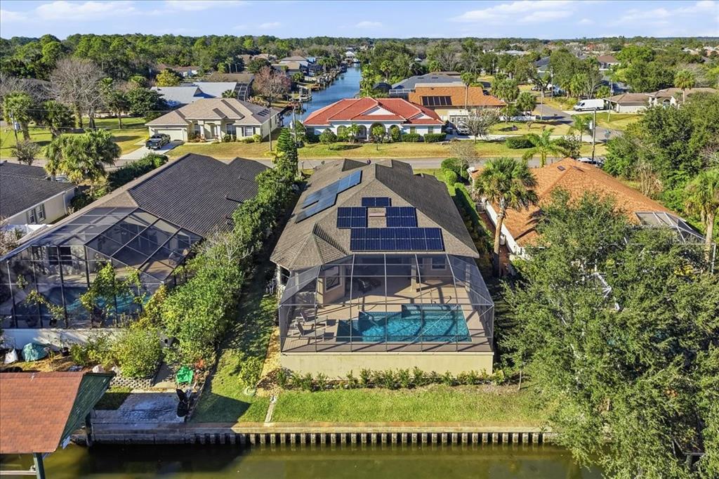 8 Cochran Lane Palm Coast, FL 32137 - Photo 38 of 40 an aerial view of residential houses with outdoor space and swimming pool