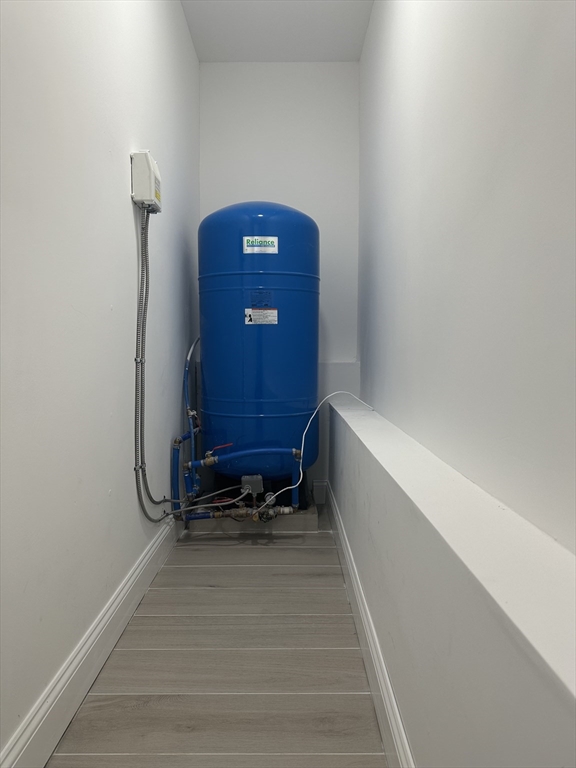 102 Wells Road Becket, MA 01223 - Photo 25 of 40 a view of a small space with racks on the wall