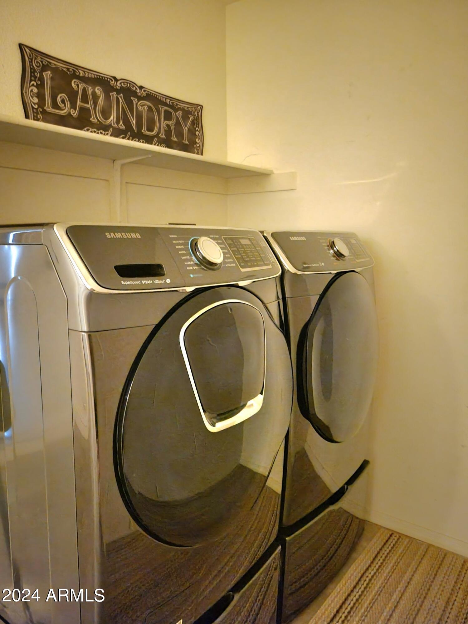 1886 East Don Carlos, Unit 164 Tempe, AZ 85281 - Photo 11 of 24 a utility room with dryer and washer