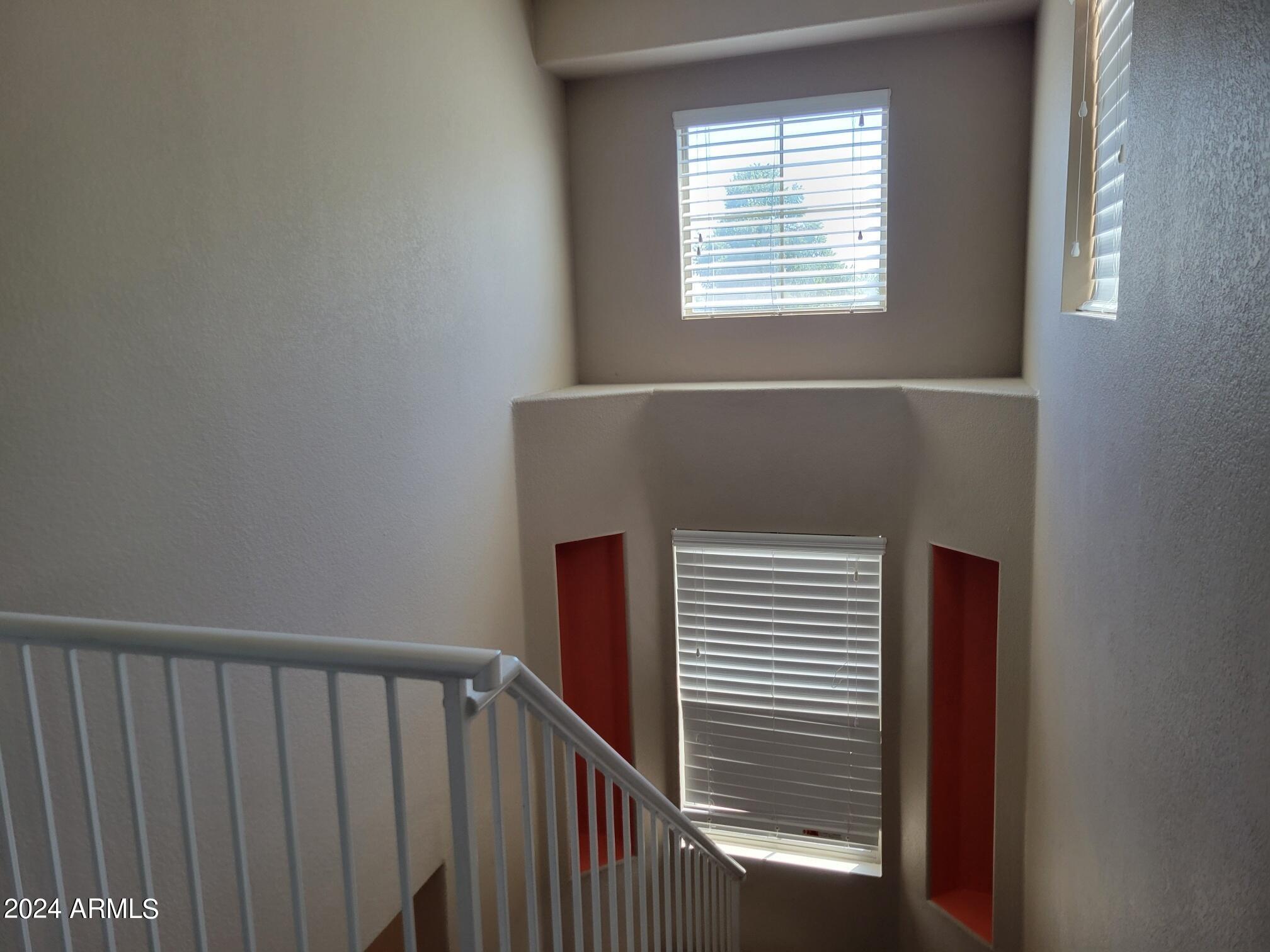 1886 East Don Carlos, Unit 164 Tempe, AZ 85281 - Photo 12 of 24 a view of a hallway with a window