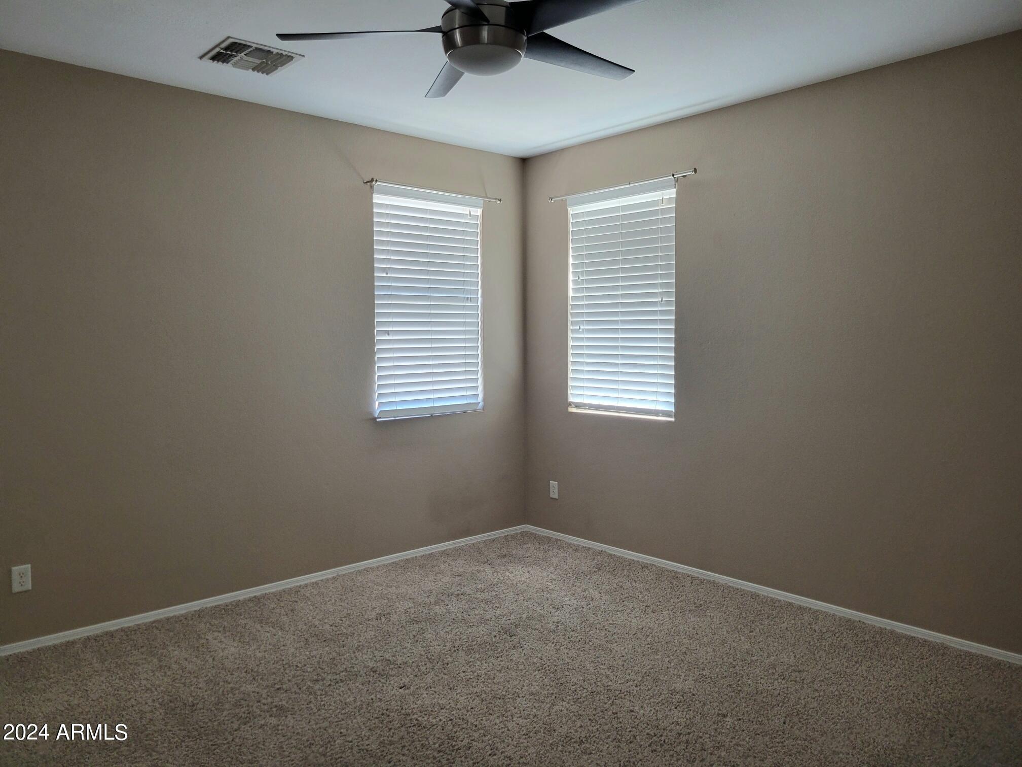 1886 East Don Carlos, Unit 164 Tempe, AZ 85281 - Photo 13 of 24 an empty room with a window