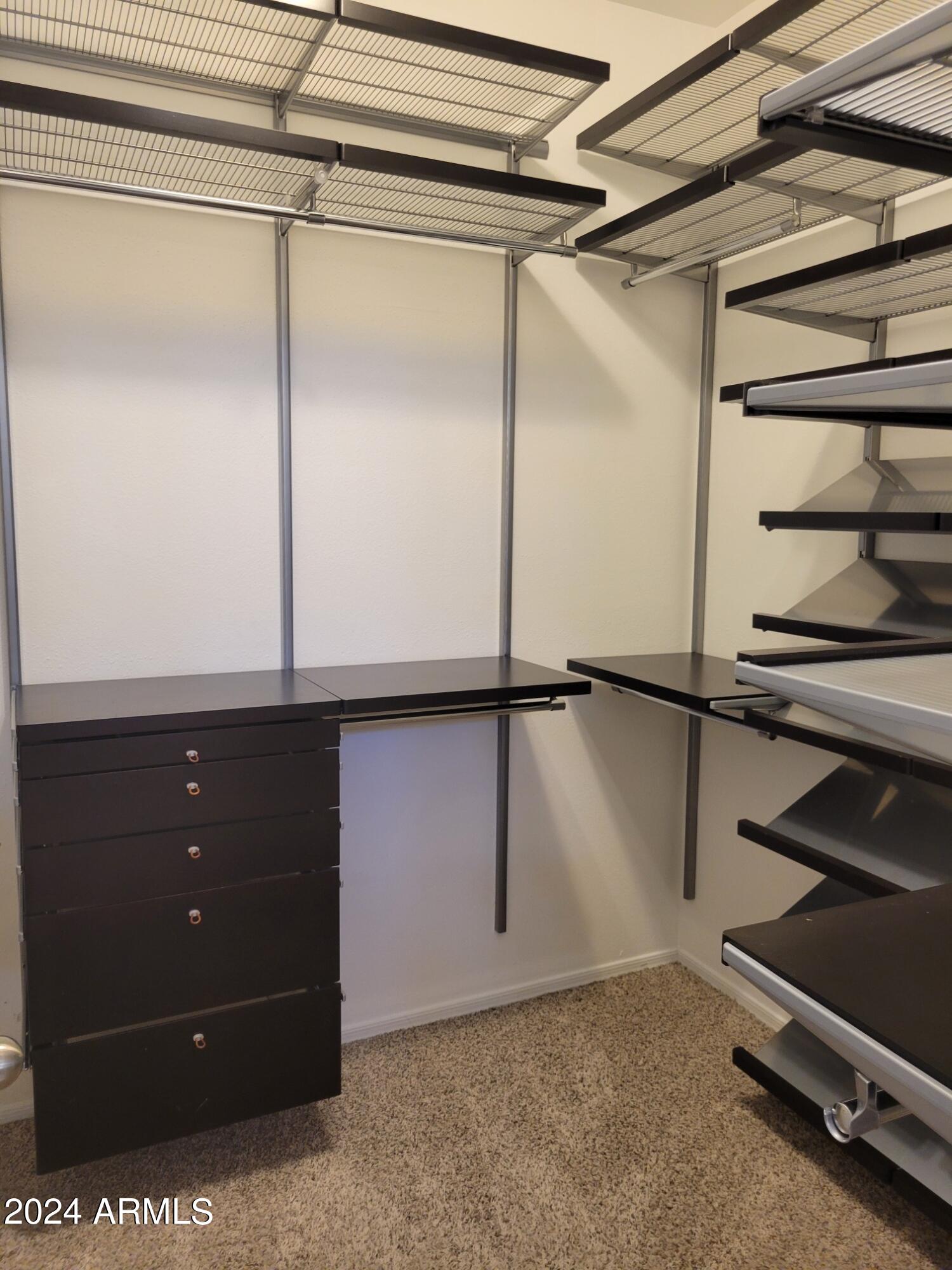 1886 East Don Carlos, Unit 164 Tempe, AZ 85281 - Photo 16 of 24 a view of a room with racks