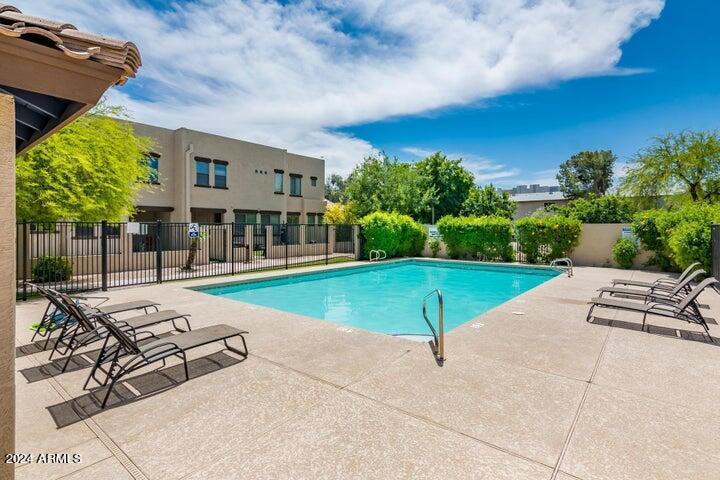 1886 East Don Carlos, Unit 164 Tempe, AZ 85281 - Photo 24 of 24 a view of a house with swimming pool and sitting area