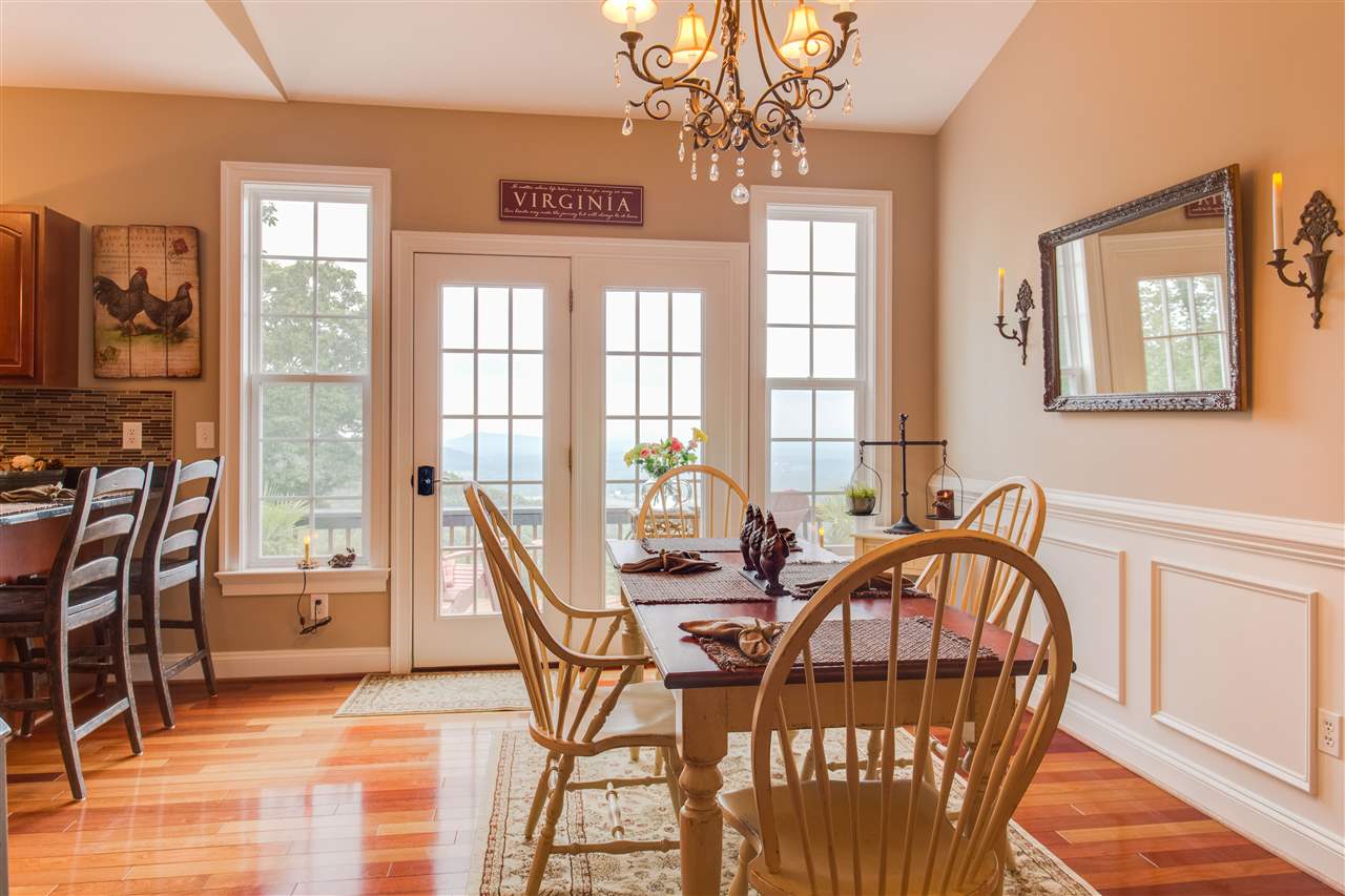 898 Turkey Ridge Road Stanardsville, VA 22973 - Photo 11 of 30 a view of a dining room with furniture window and outside view