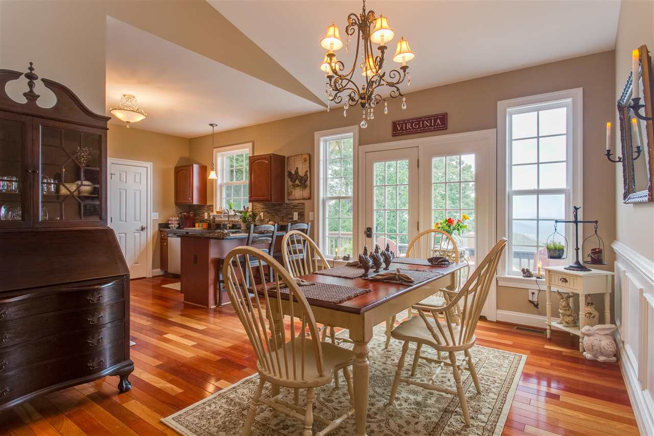 898 Turkey Ridge Road Stanardsville, VA 22973 - Photo 12 of 30 a view of a dining room with furniture window and outside view