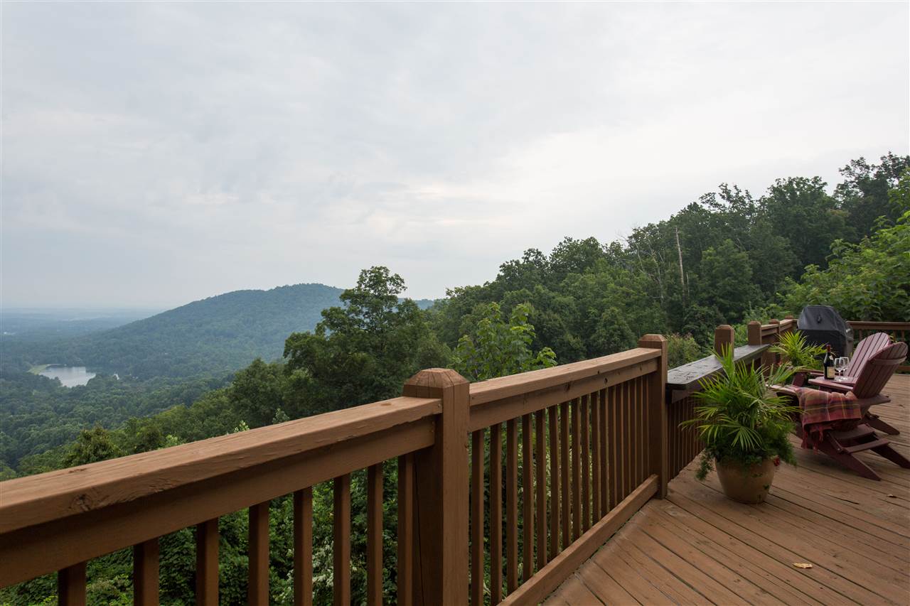 898 Turkey Ridge Road Stanardsville, VA 22973 - Photo 25 of 30 a balcony with wooden floor and outdoor space