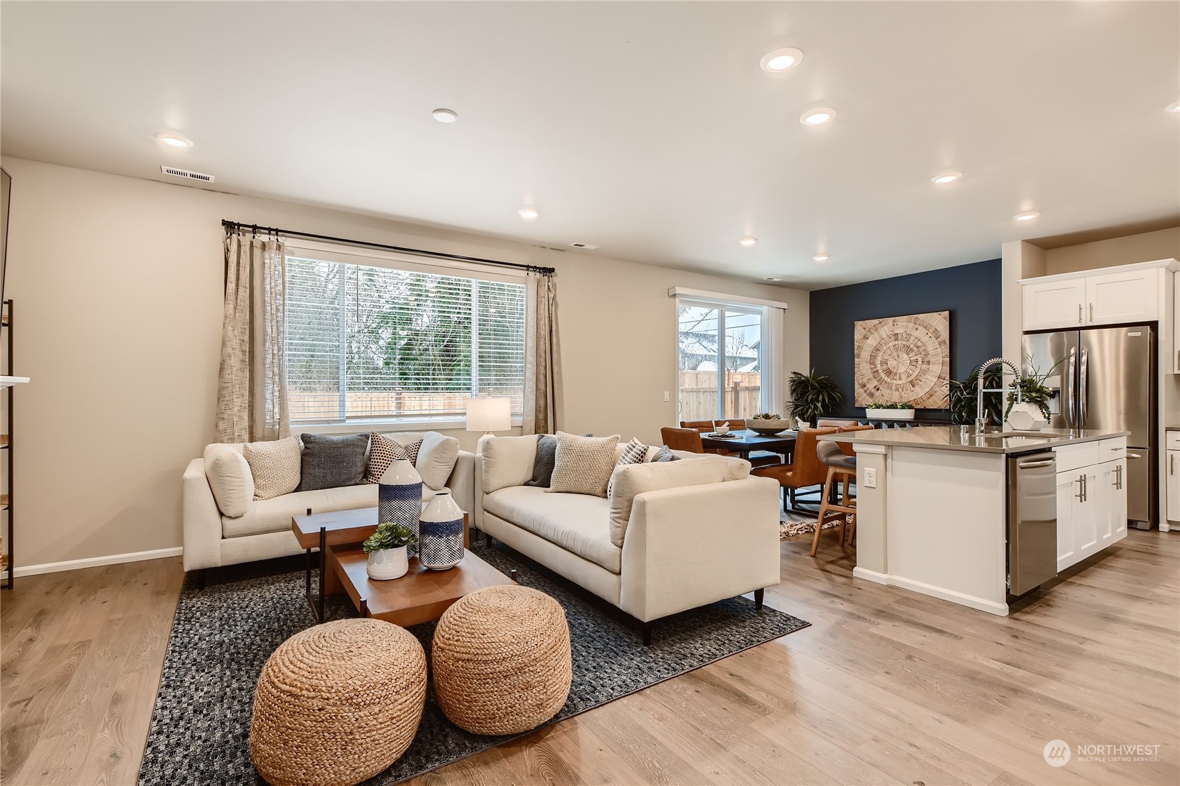 20811 42nd Avenue Southeast, Unit 204 Bothell, WA 98021 - Photo 15 of 24 a living room with furniture and wooden floor