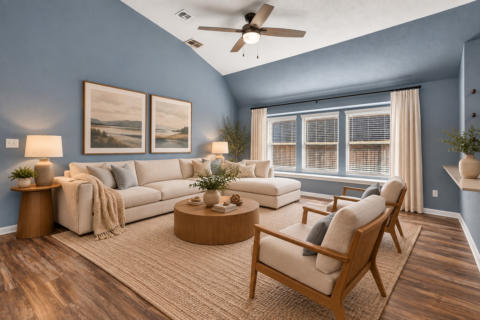 216 Spinnaker Loop Kyle, TX 78640 - Photo 7 of 23 Vaulted ceilings and warm wood floors anchor this inviting living space.
