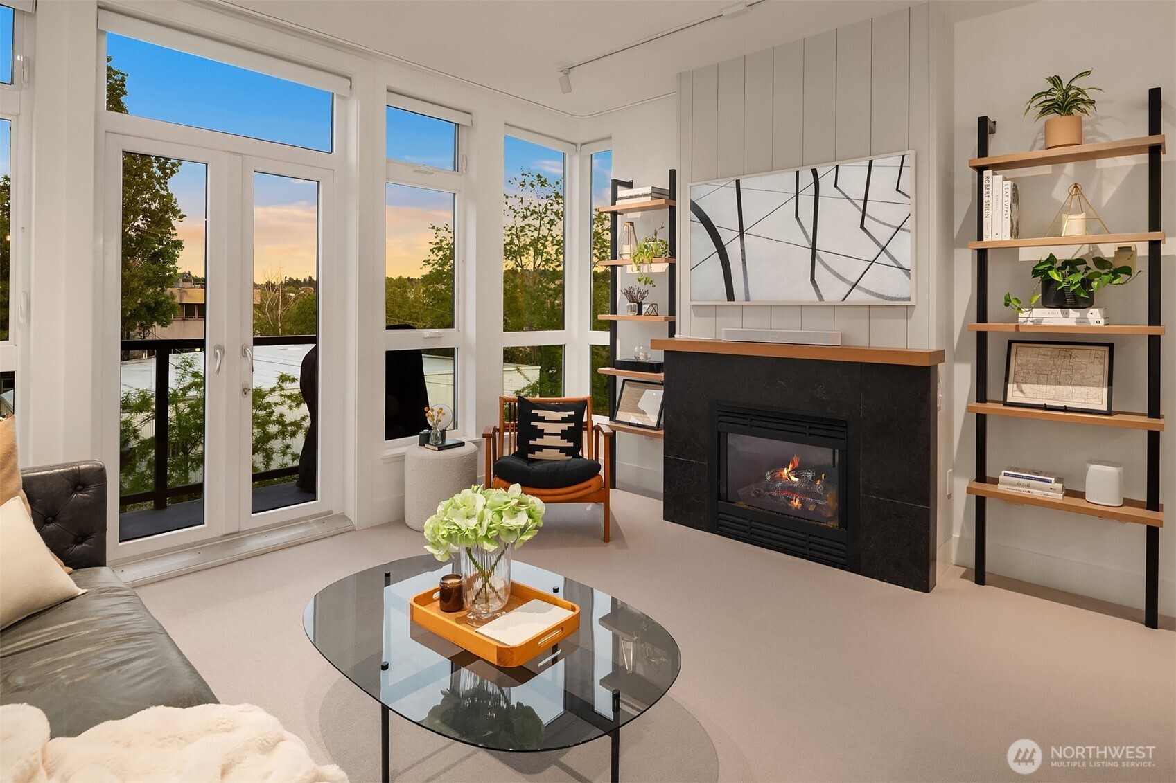 1730 North Northlake Way, Unit 415 Seattle, WA 98103 - Photo 14 of 40 a living room with furniture and a fireplace