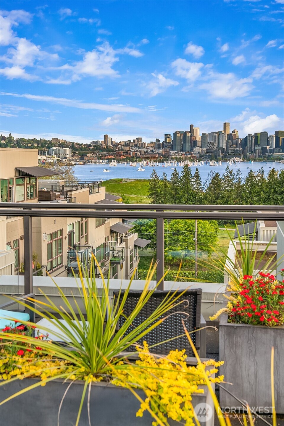 1730 North Northlake Way, Unit 415 Seattle, WA 98103 - Photo 15 of 40 a view of a balcony with lake view and mountain view