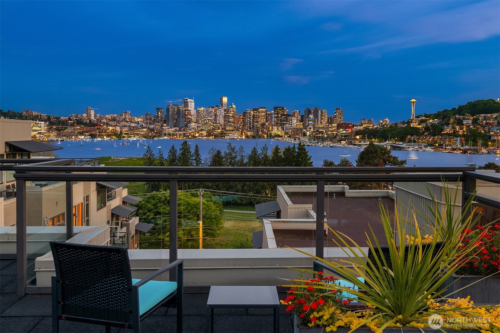 1730 North Northlake Way, Unit 415 Seattle, WA 98103 - Photo 16 of 40 a view of a chairs and table in patio